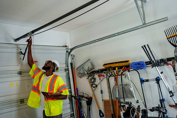 Professional Garage Door Maintenance technician working in Evansdale, IA